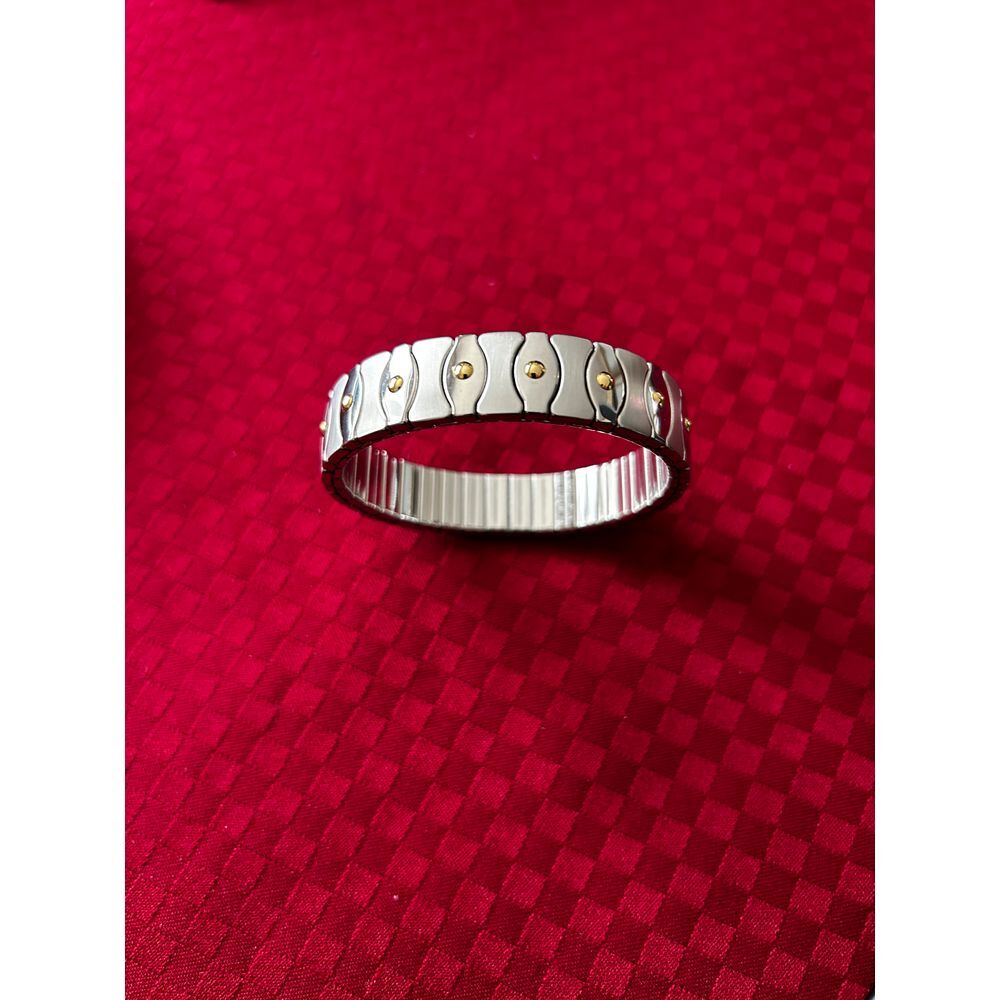 Stainless Steel Bracelet Adorned With 18k Gold‎ Accents. Stretchable